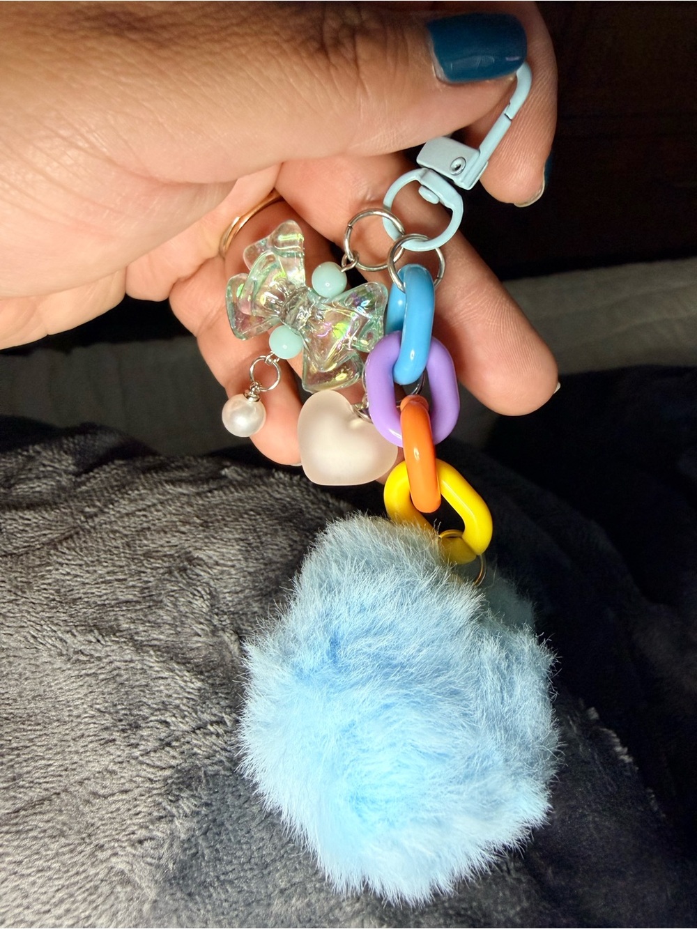 Plush Light Blue Pom Pom Pet Toy with Colorful Links and Charms